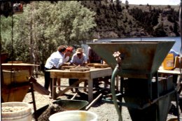 Mechanical shake table used to separate high specific gravity mineral that may contain sapphires.