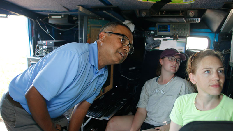 Instructor in field van 