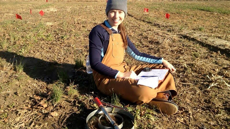 Jill Motschenbacher with soil sample