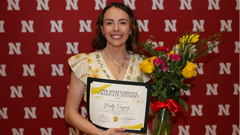 Maddy Vasquez with award