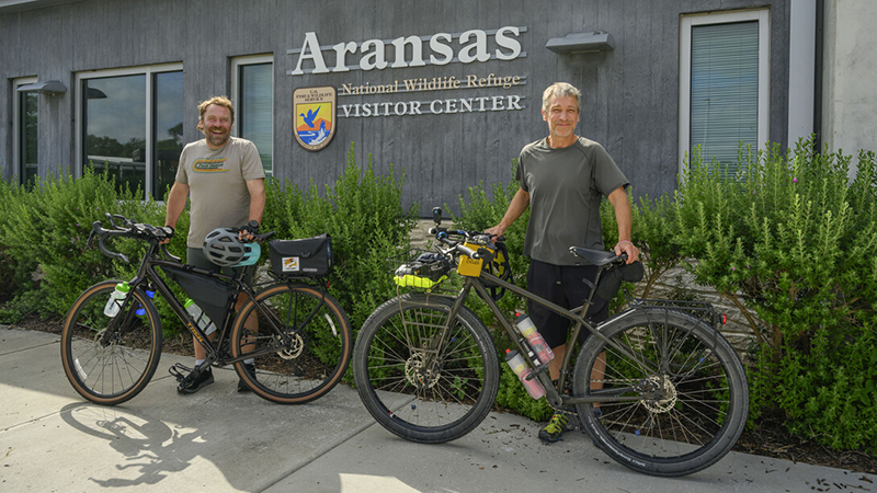 Husker duo bikes Whooper Highway to spotlight endangered cranes