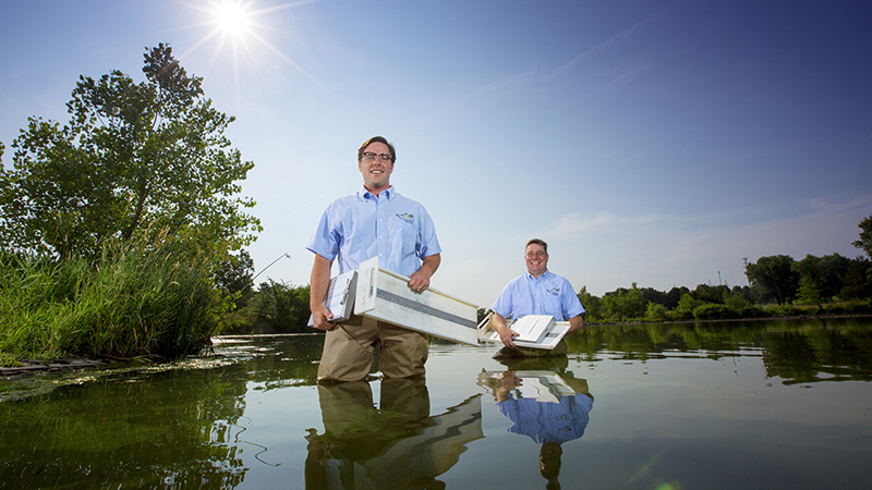 Chizinski and Pope in Water