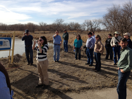 JoLeisa Cramer, with camera, assists with a Water Leaders Academy tour of a Platte River Recovery Implementation Program project