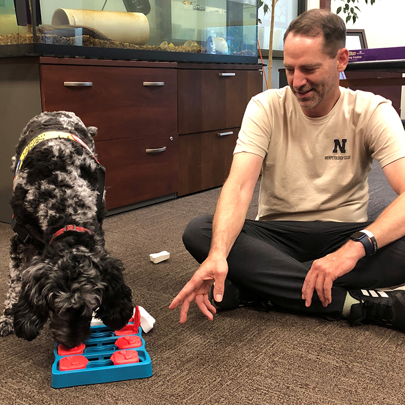 Kenneth and River with dog toy