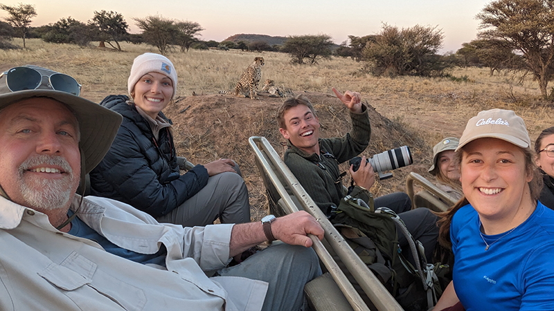 Powell and students with cheetahs