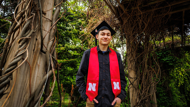 Caden Simon in graduation gown